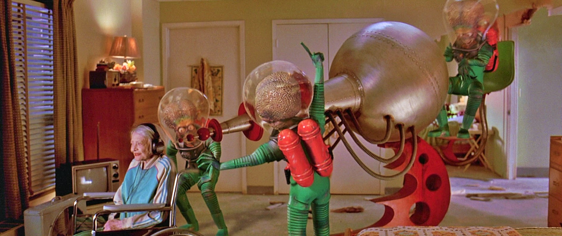 Un americano a Parigi, Blackhat, 8½, Mars Attacks! e altri film in TV della settimana